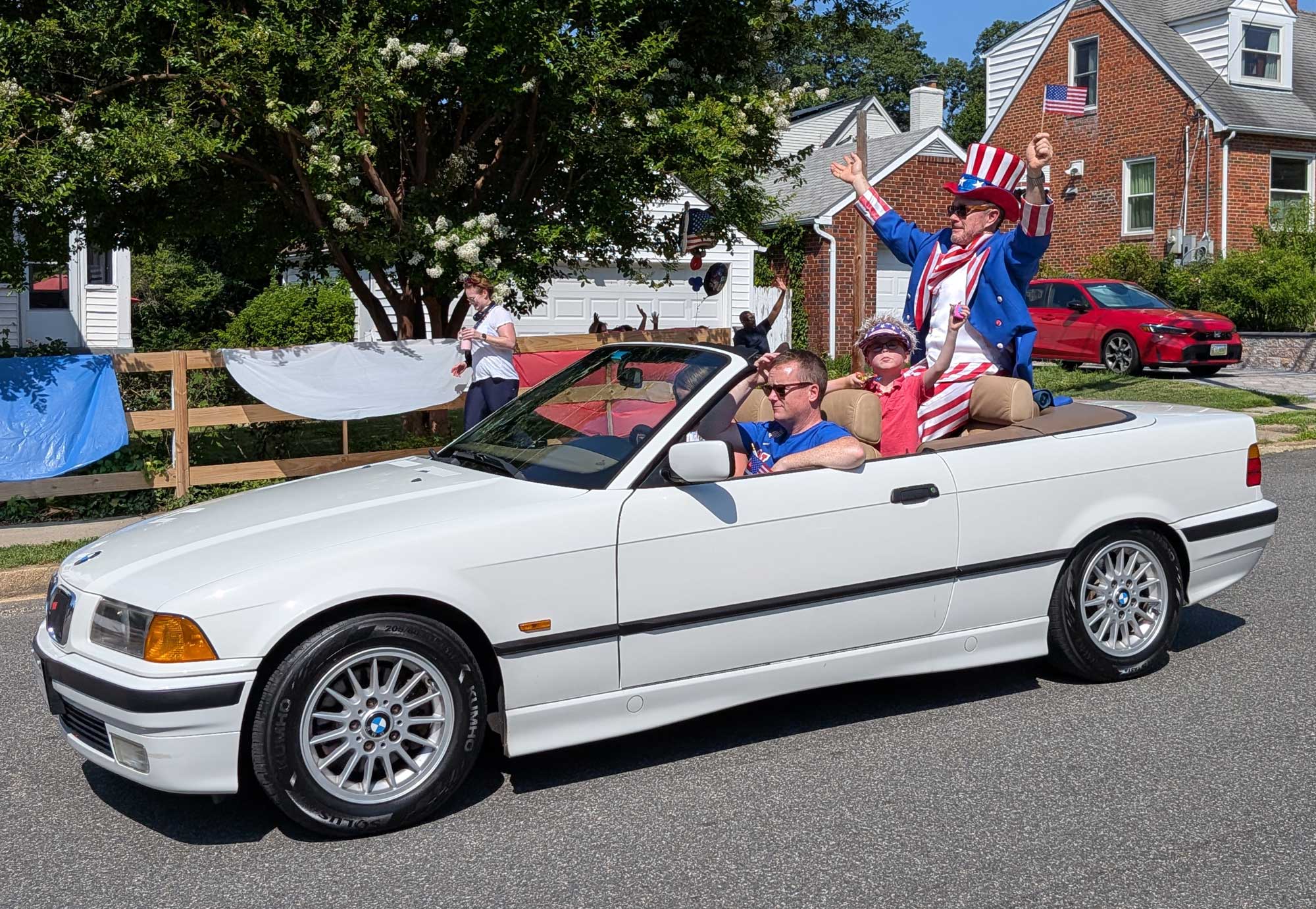 Uncle Sam sitting on the back of a convertible